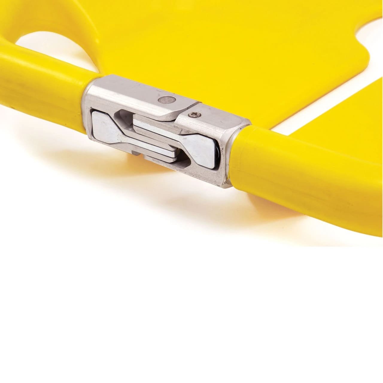 Examining the surface of an aluminum scoop stretcher for dents or cracks