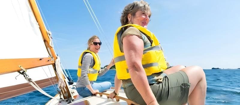 Adult wearing a life jacket during a boat trip