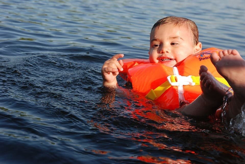 A child-sized life jacket designed to fit a smaller wearer