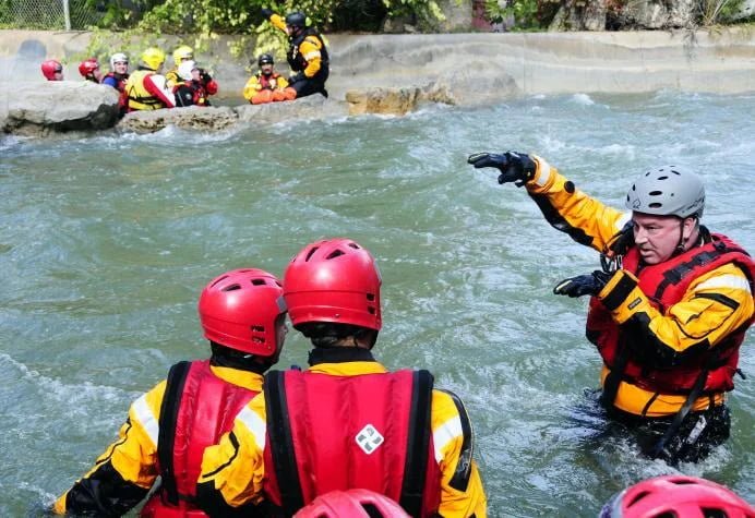 Water rescue team wearing professional safety equipment